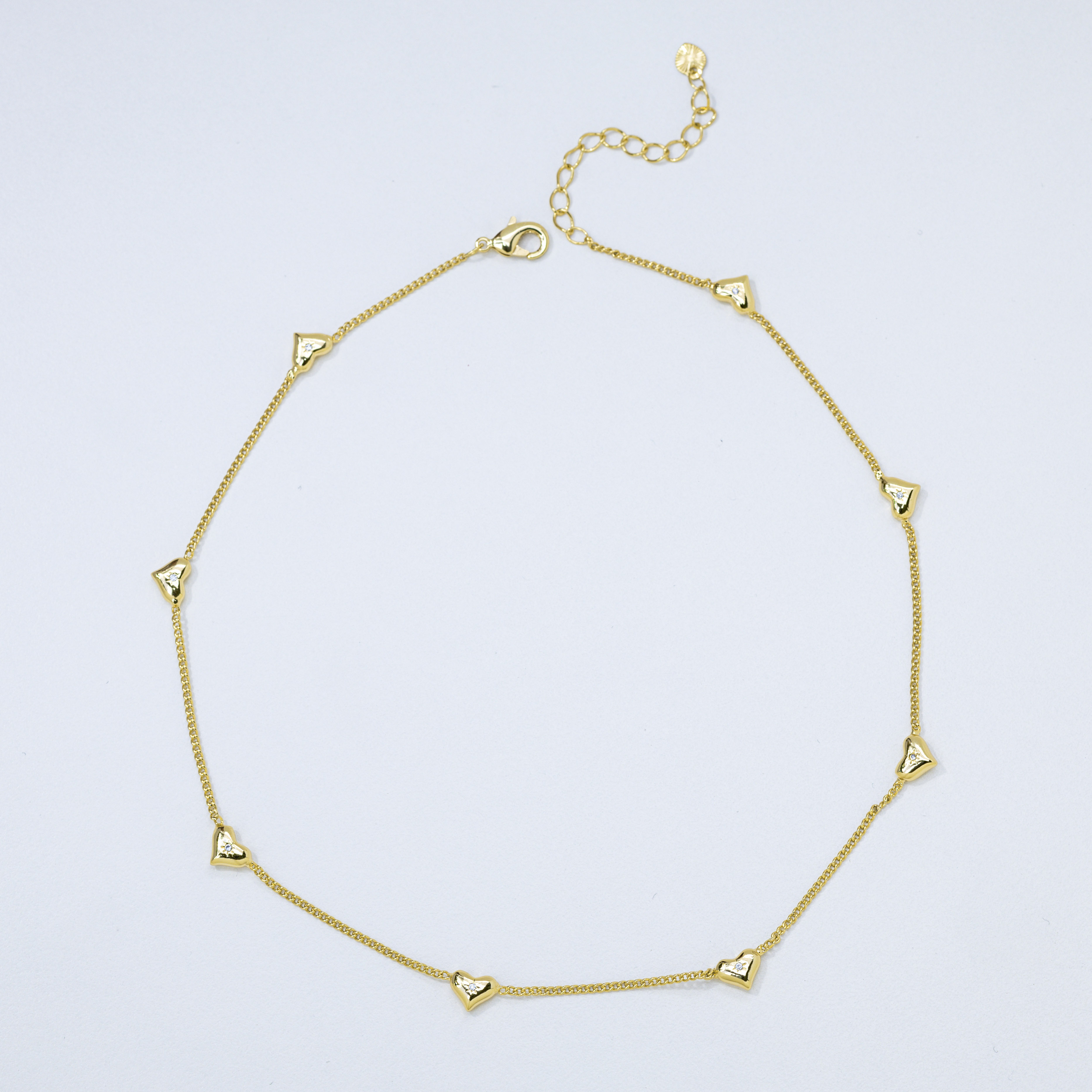 20109 Gold Chain with Modern Heart Pendants